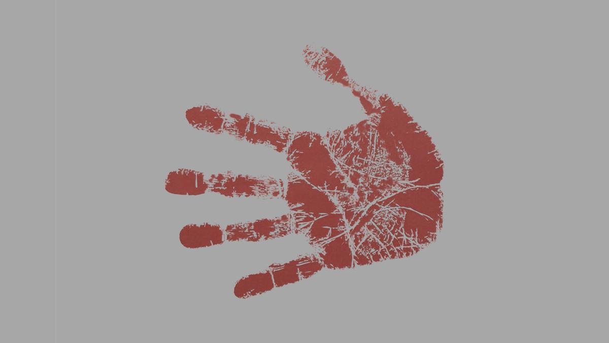 Red handprint on gray background.